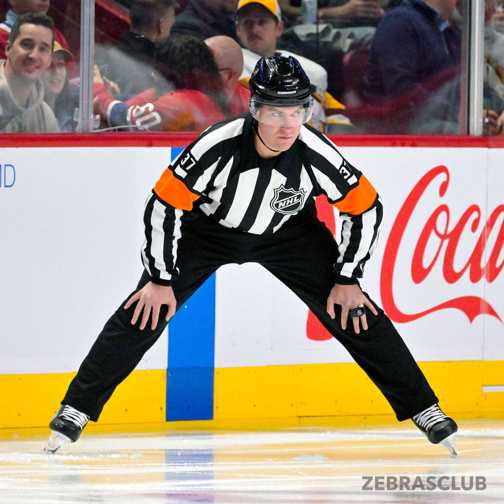 NHL referee wearing the Zebrasclub ZP-PRO Padded hockey referee pants