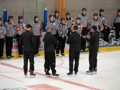 What equipment does a beginner hockey referee need?