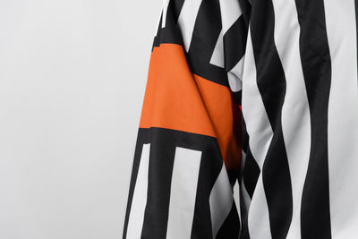 Zebrasclub ZR1 hockey referee jersey with sublimated orange arm bands close view
