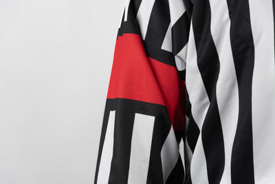 Zebrasclub ZR1 hockey referee jersey with sublimated red arm bands close view