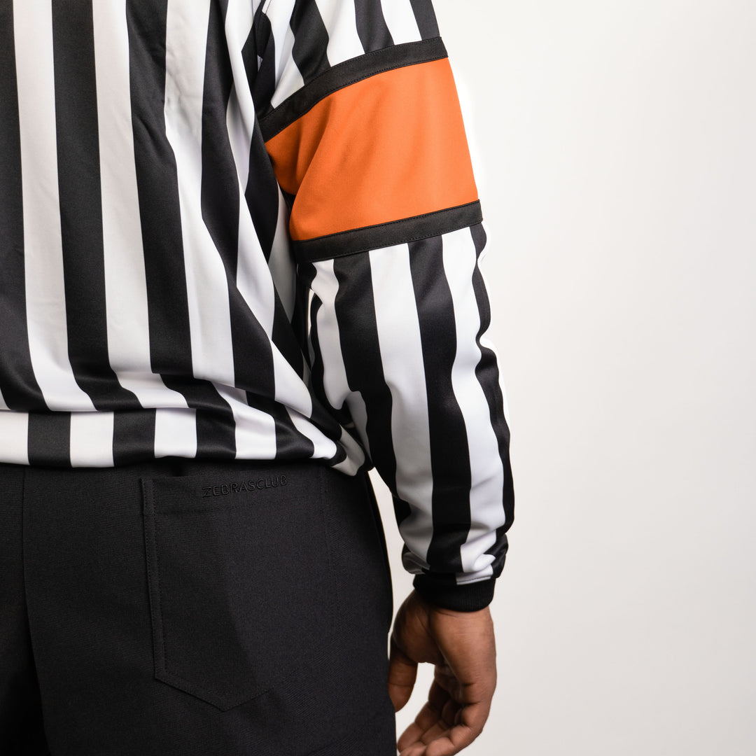 Zebrasclub zr-pro hockey referee jersey with orange sewn-in arm bands close view