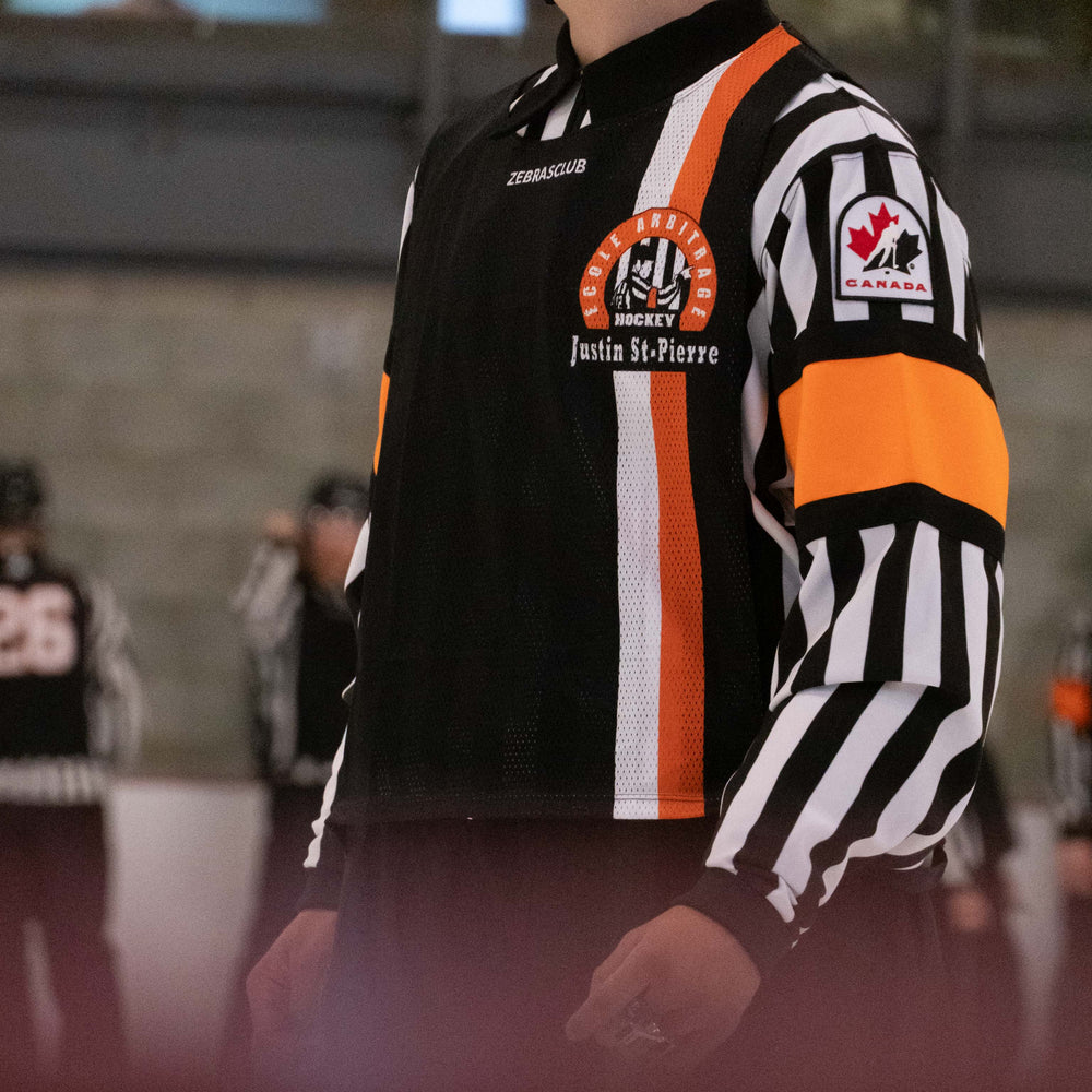 Zebrasclub hockey referee bib on the ice